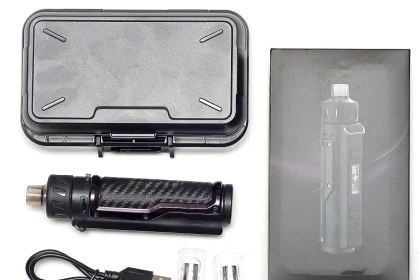 A row of electronic cigarette devices and e-liquid bottles on display