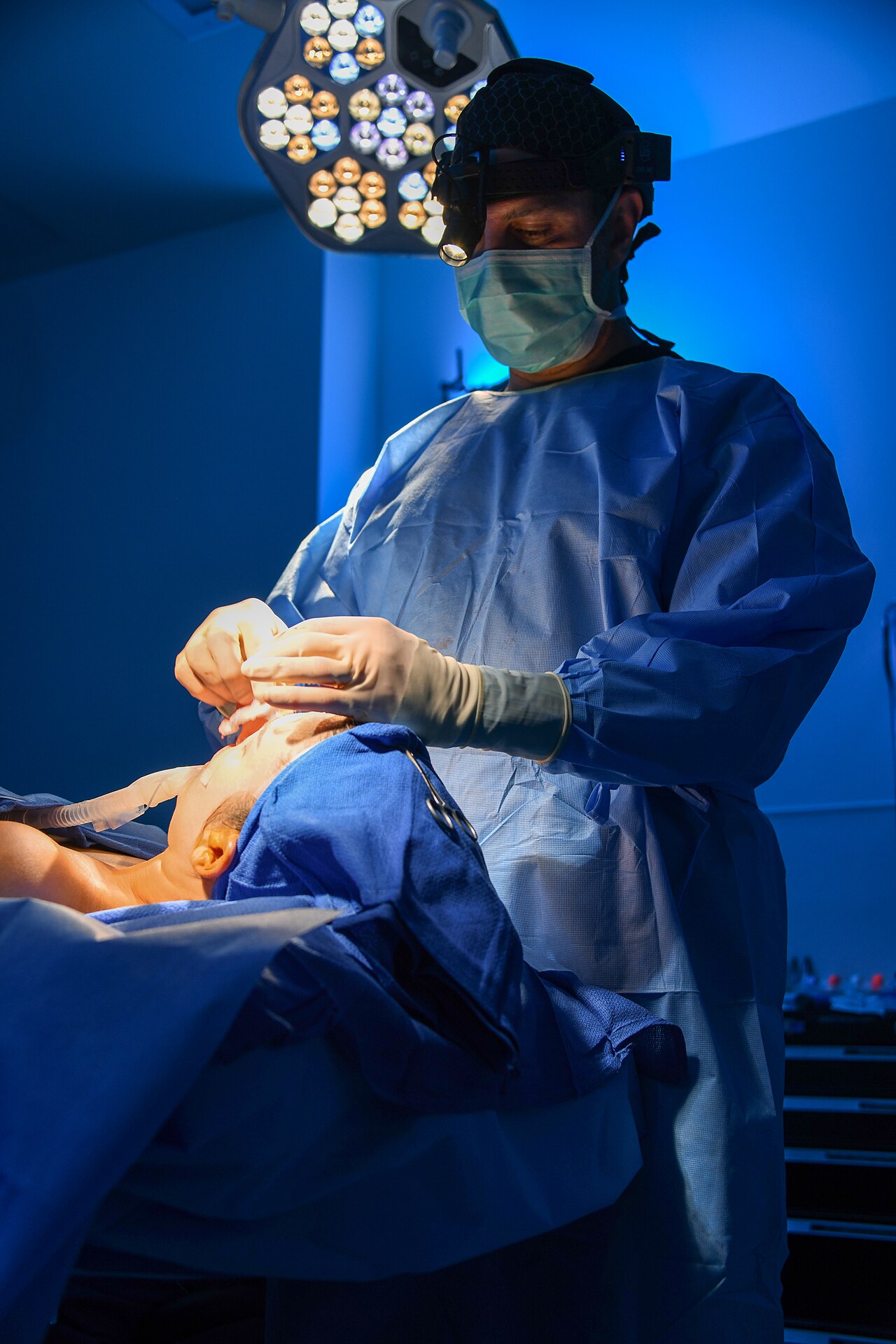 Surgeon performing an operation in an operating room
