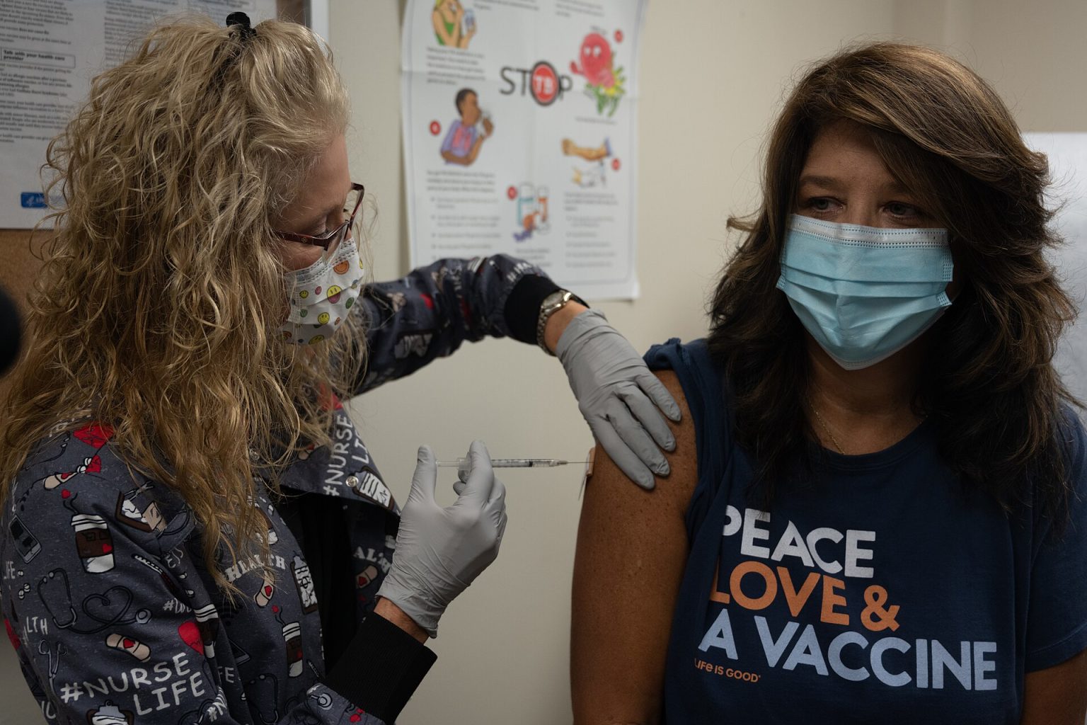 Healthcare worker preparing a measles MMR vaccination, illustrating guidance as US measles cases rise